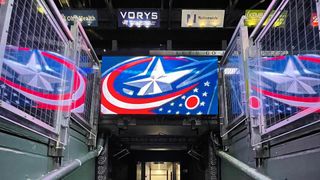 The colorful red, white and blue swoosh and star logo of the Columbus Blue Jackets on an SNA Display.