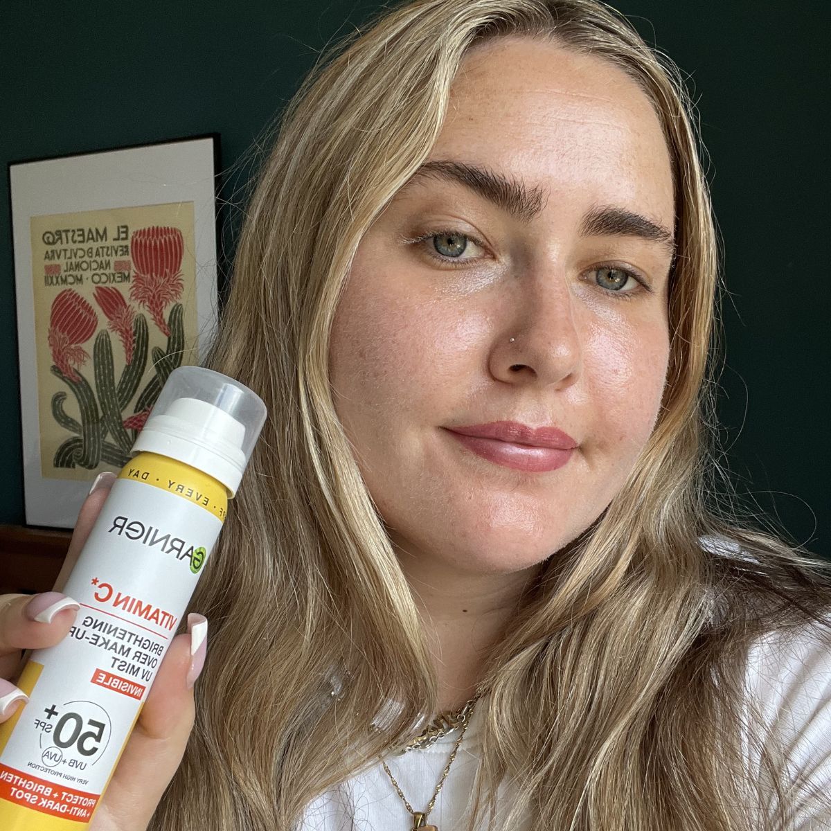 Amelia wearing Garnier Vitamin C Brightening Over Make-Up UV Mist