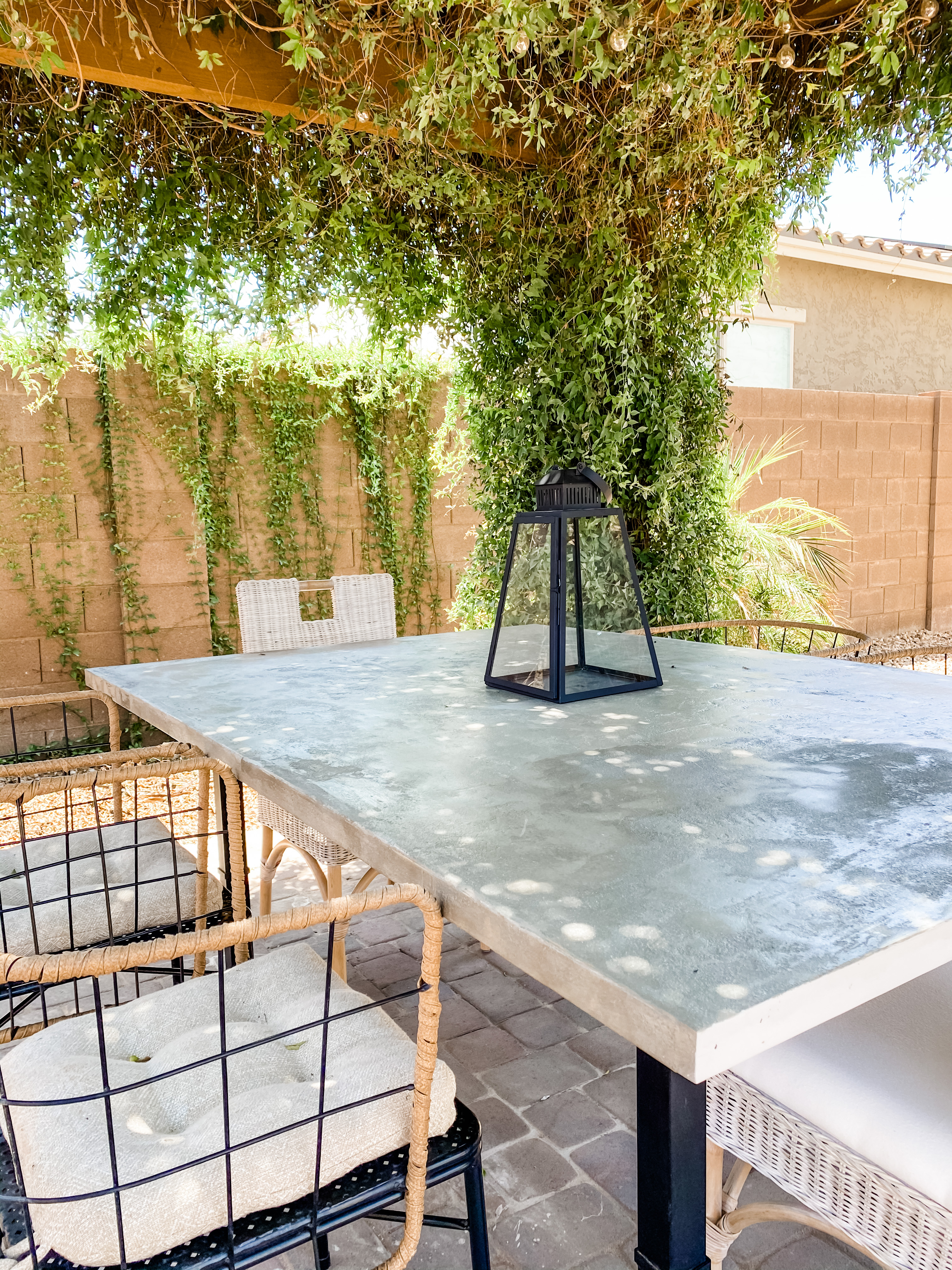 outdoor dining area with pergola cover