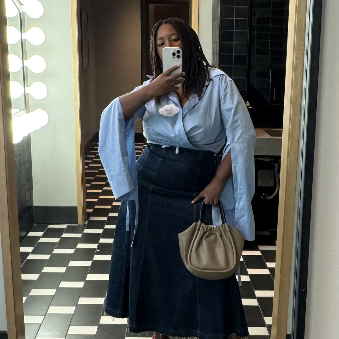 Mecca James-Williams wearing a work outfit at a professional conference