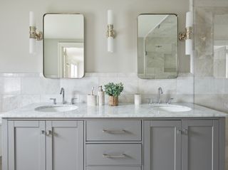 gray double vanity unit with marble top