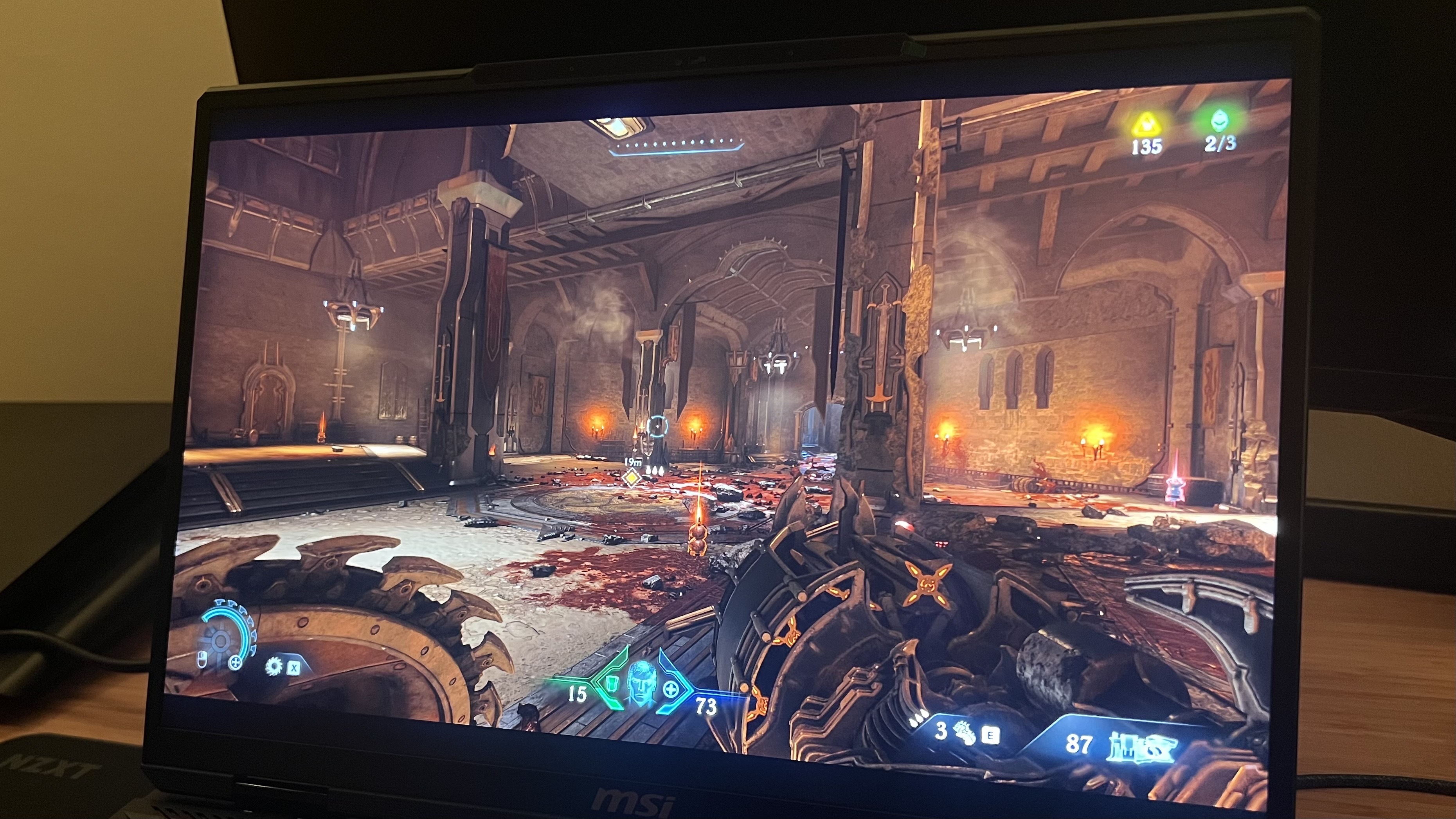 MSI Raider A18 HX display showing an arena from Doom: The Dark Ages