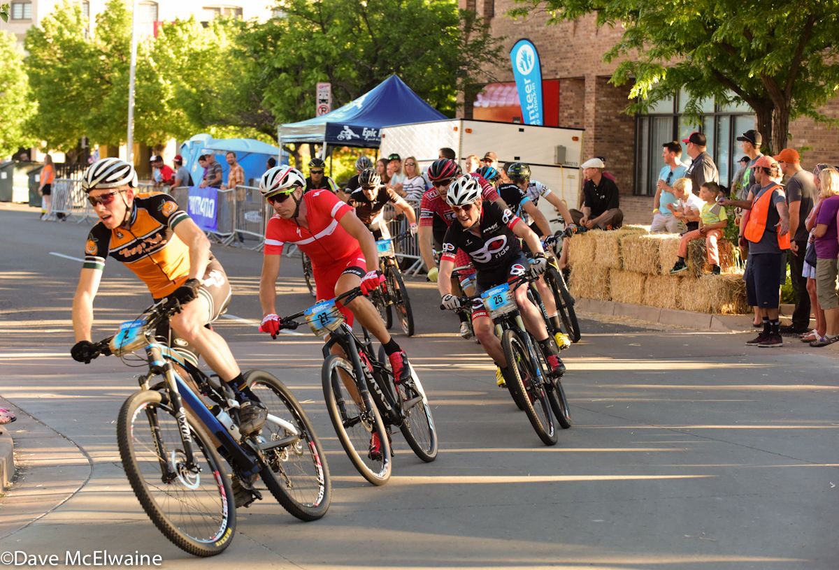 Robinson Barkley (Orange Peel) riding towards the end of the large chase group with Todd Wells following him