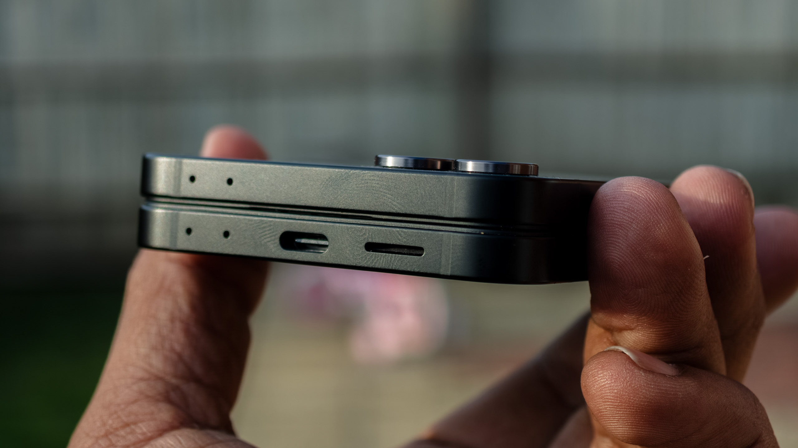 USB-C port on the Samsung Galaxy Z Flip 7 FE in Black in the hand