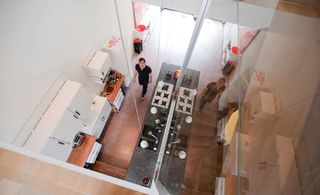 A view of the kitchen captured from floor above.