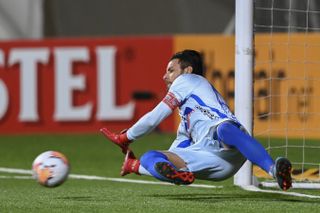 Junior's Sebastian Viera saves a penalty against La Calera in the Copa Sudamericana in 2020.