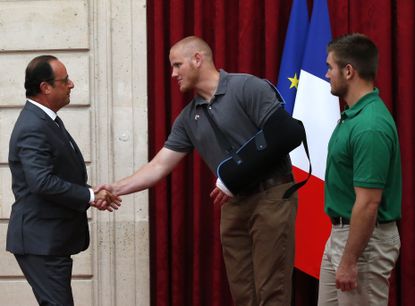 France awards Legion or Honor to 3 Americans, 1 Briton