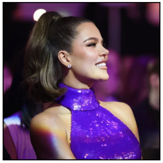 khloe kardashian wearing purple dress