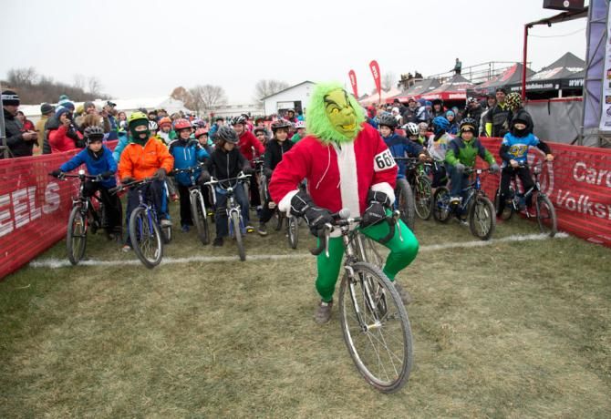 Starting the kids race, the Grinch leads them off the line