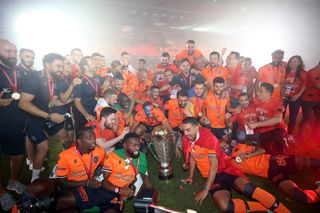 Istanbul Basaksehir players and staff celebrate after winning the Turkish Super Lig title in 2020.