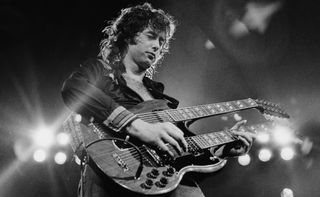 Jimmy Page performs with Led Zeppelin at the Seattle Coliseum in June 1972