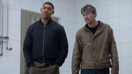 Aaron Pierre as John Stewart and Kyle Chandler as Hal Jordan in Lanterns episode 4