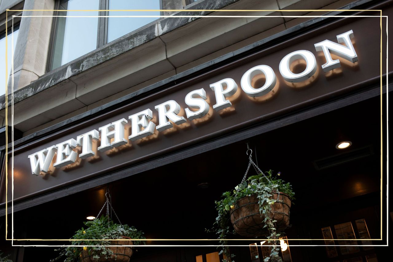 a close up of a Wetherspoons sign on a Wetherspoons pub which has closed