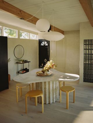 dining area with table and stools