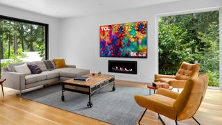 The TCL 6-Series 8K TV in a spacious living room displaying vibrant colors.