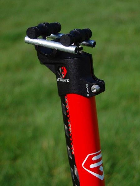 The integrated seatmast is topped with a tidy looking head but it looks like it has to be removed in order to make angle adjustments.