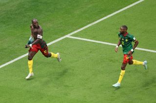 Cameroon celebrate their winning goal over Brazil