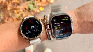 a photo of the Apple Watch Ultra 4 and Garmin Fenix 9 Pro on the wrist 