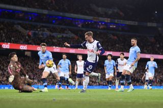 James Maddison of Tottenham Hotspur scores their 2nd goal during the Premier League match between Manchester City FC and Tottenham Hotspur FC at Etihad Stadium on November 23, 2024 in Manchester, England.