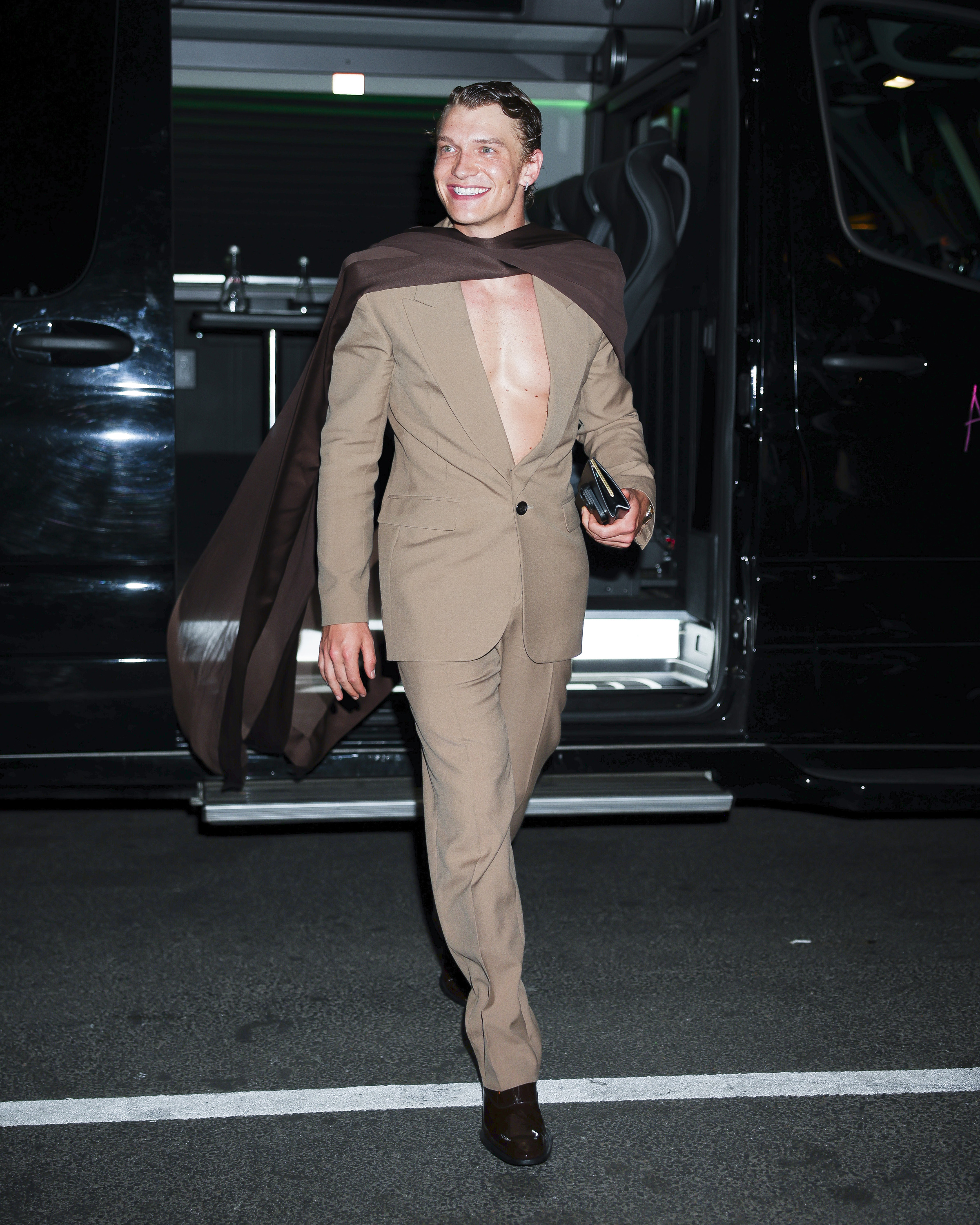 Connor Storrie wore a shirtless suit with a cape to a 2026 Met Gala after-party