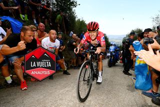 LES PRAERES-NAVA, SPAIN - AUGUST 28: Remco Evenepoel of Belgium and Team Quick-Step - Alpha Vinyl - Red Leader Jersey attacks while fans cheer during the 77th Tour of Spain 2022, Stage 9 a 171,4km stage from Villaviciosa to Les Praeres. Nava 743m / #LaVuelta22 / #WorldTour / on August 28, 2022 in Les Praeres. Nava, Spain. (Photo by Tim de Waele/Getty Images)