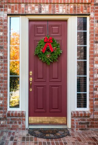 Christmas wreath on a red door