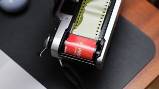 Harman Phoenix 35mm film canister loaded in a Canon A-E1 film camera