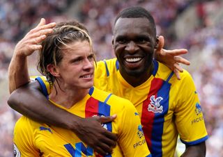 Crystal Palace’s Conor Gallagher (left) celebrates scoring their side’s second goal of the game with team-mate Wilfried Zaha during the Premier League match at the London Stadium, London. Picture date: Saturday August 28, 2021