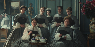 Six Austrian ladies-in-waiting sit and stand in the Empress's chamber and drink tea, in the Netflix show 'The Empress.'