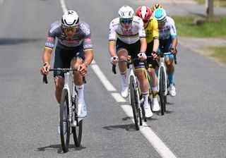 MONTLUCON, FRANCE - JUNE 08: (L-R) Mathieu van der Poel of Netherlands and Team Alpecin - Deceuninck, Tadej Pogacar of Slovenia and UAE Team Emirates - XRG, Jonas Vingegaard of Denmark and Team Visma | Lease a Bike compete in the breakaway during the 77th Criterium du Dauphine 2025, Stage 1 a 195.8km stage from Domerat to Montlucon / #UCIWT / on June 08, 2025 in Montlucon, France. (Photo by Dario Belingheri/Getty Images)