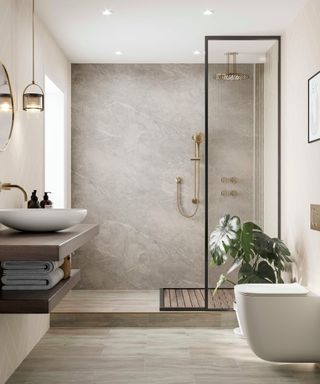 bathroom finished with marble effect wall panel system in raised shower area