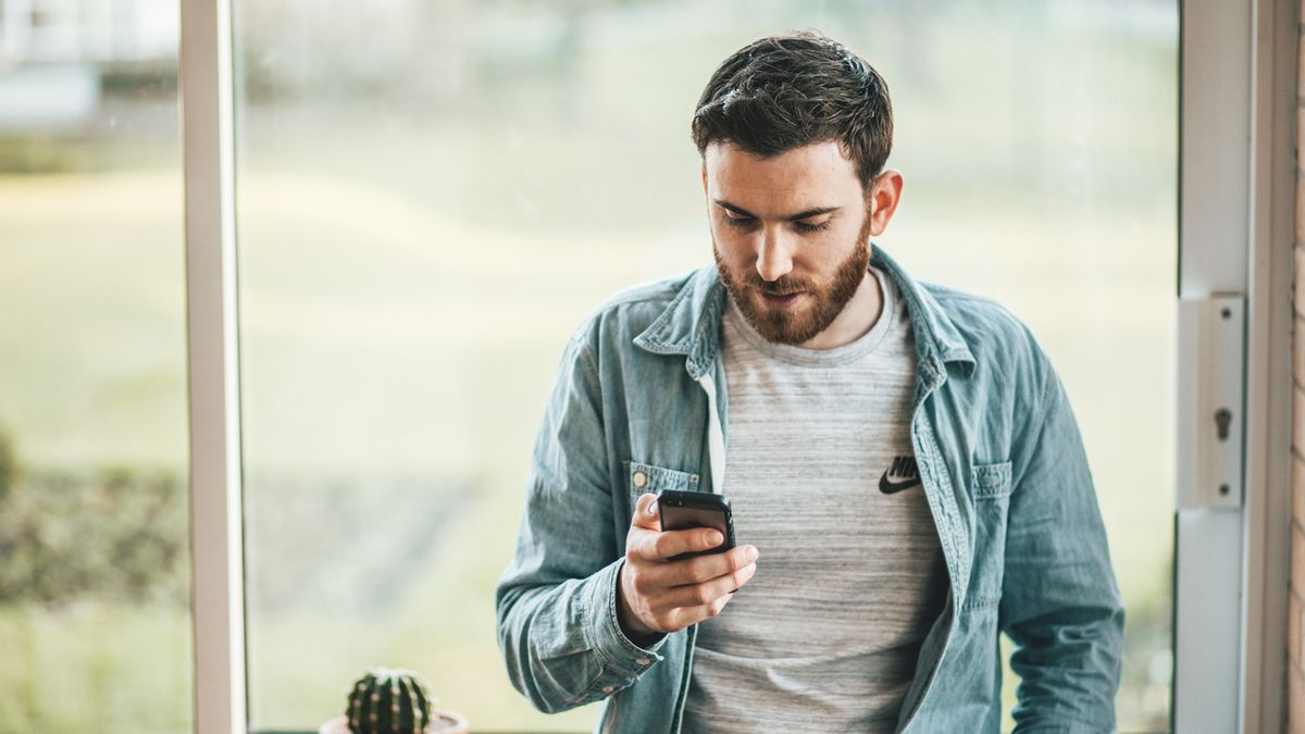 Man holding iPhone