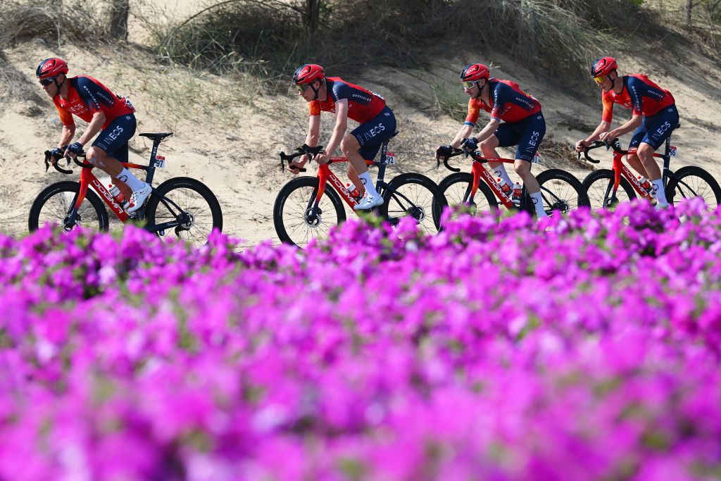 DUBAI HARBOUR UNITED ARAB EMIRATES FEBRUARY 23 LR Cameron Wurf of Australia Kim Alexander Heiduk of Germany and Elia Viviani of Italy and Team INEOS Grenadiers compete during the 5th UAE Tour Stage 4 a 174km stage from Al Shindagha to Dubai Harbour UAETour UCIWT on February 23 2023 in Dubai Harbour United Arab Emirates Photo by Dario BelingheriGetty Images