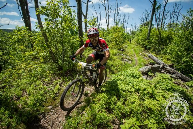 Kurt Gensheimer rides against the beautiful skyl ine of the Tussey Ridge