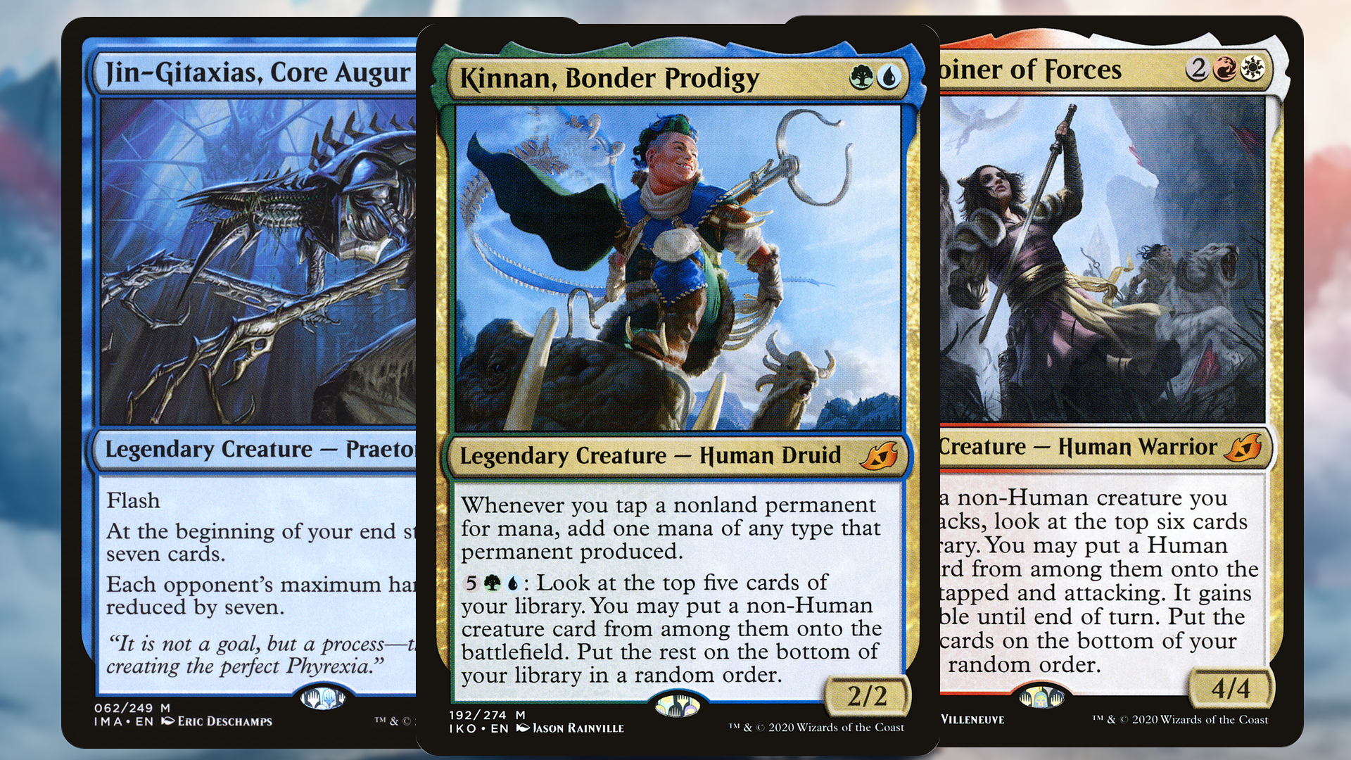 Three Magic: The Gathering cards laid on top of each other against a blurred background