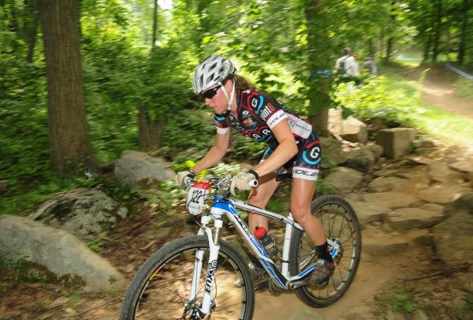 Deidre York (The Gear Movement) riding through one of the rock gardens at the far end of the course