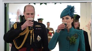 Prince William and Kate Middleton drinking Guiness