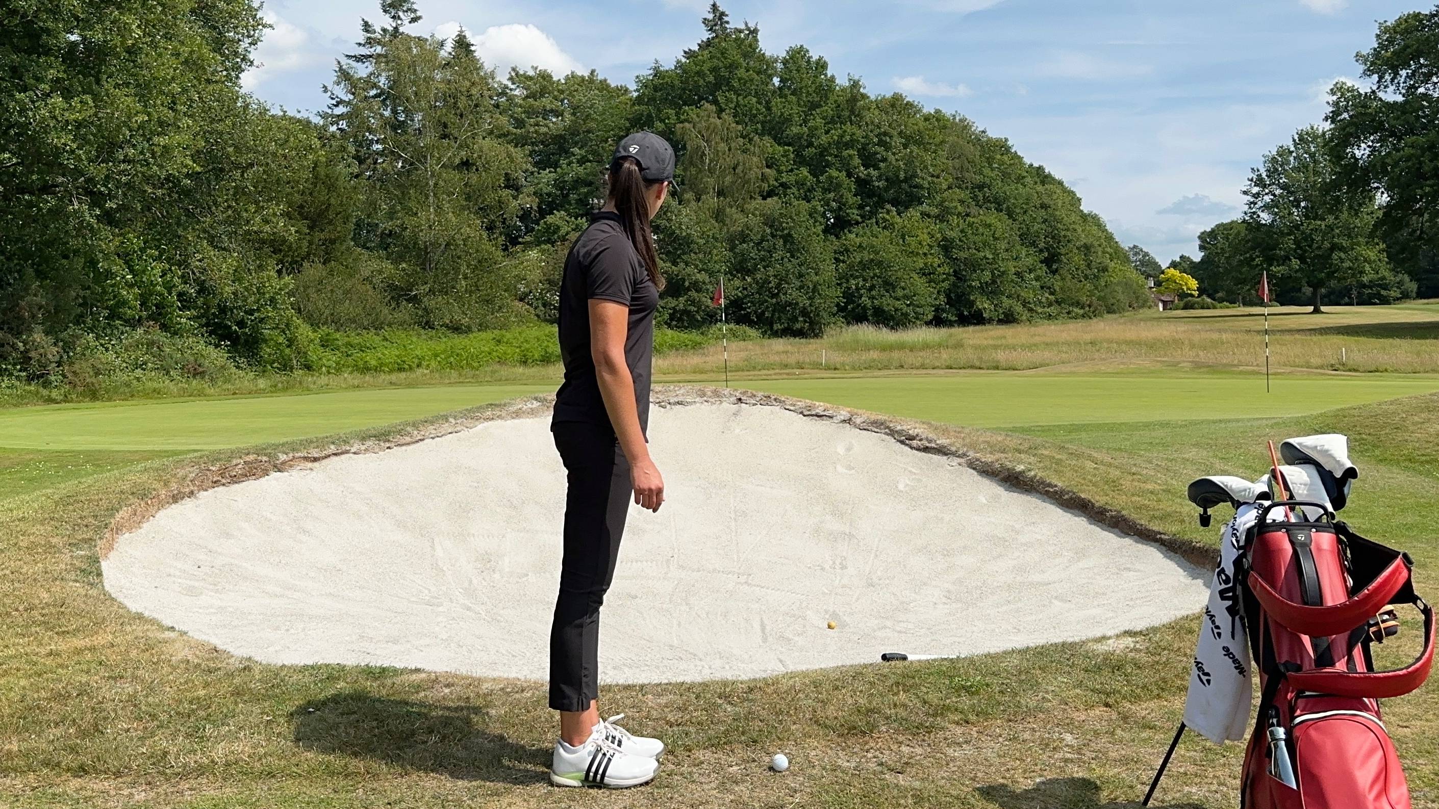 Jess Ratcliffe considering a shot over a greenside bunker
