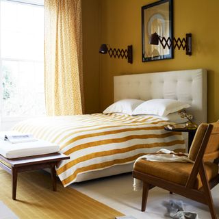 bedroom with gen z yellow wall and curtains on window