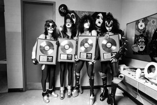 Kiss at Nassau Coliseum, New York with gold discs for Alive!