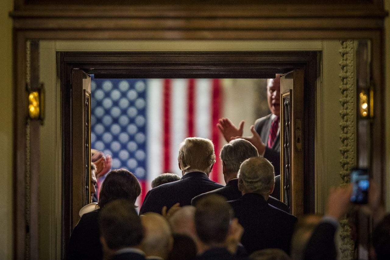 Trump enters the House of Representatives chamber