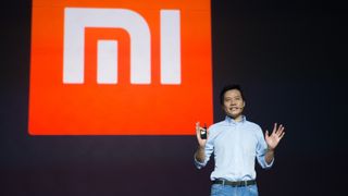 Xiaomi CEO Lei Jun speaking at a conference