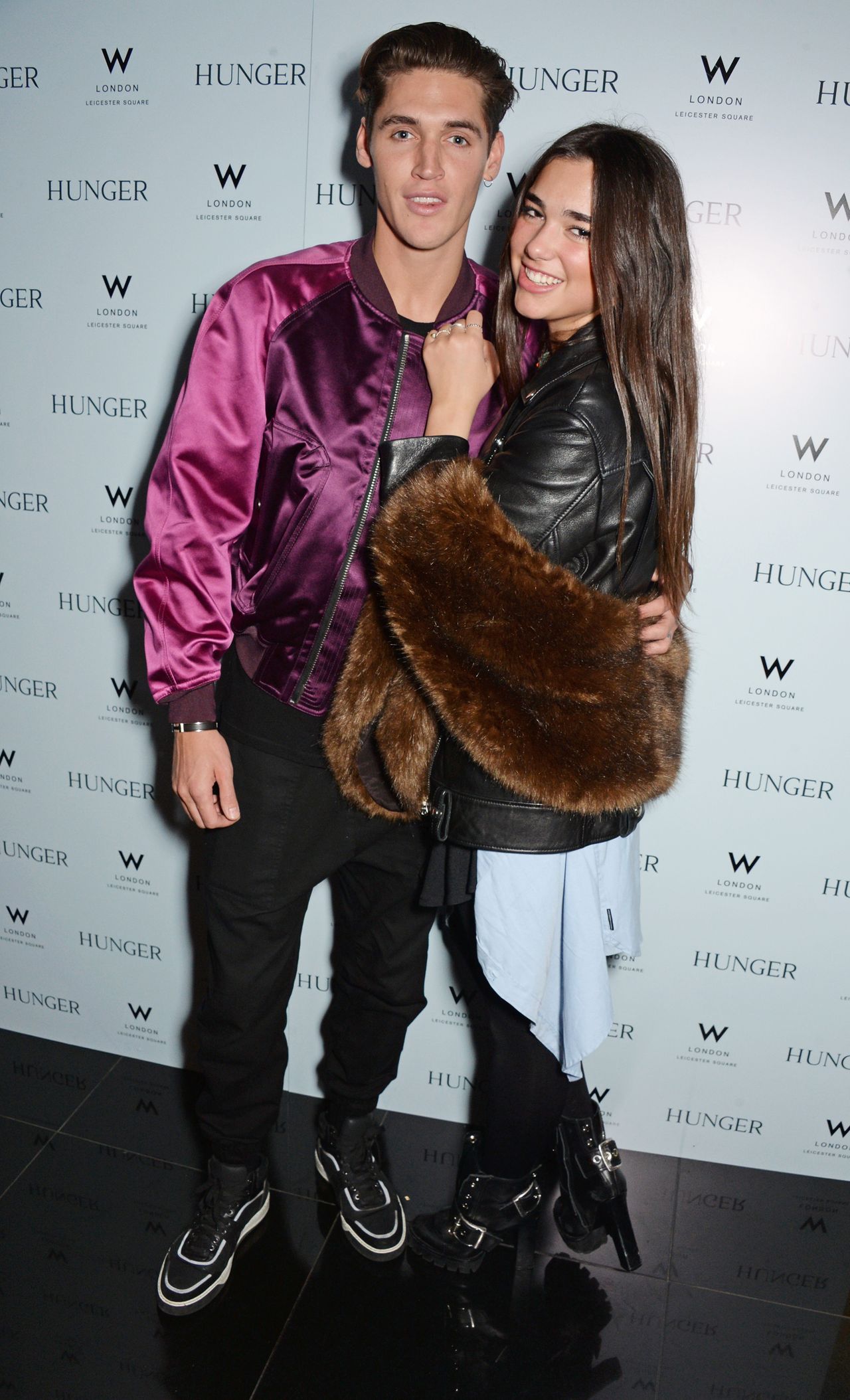 LONDON, ENGLAND - FEBRUARY 20: Isaac Carew (L) and Dua Lipa attend the launch of 'Hunger Magazine, We've Got Issues' at W London - Leicester Square on February 20, 2015 in London, England. (Photo by David M. Benett/Getty Images for Hunger Magazine)