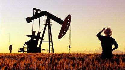 Oil well pump in a field 