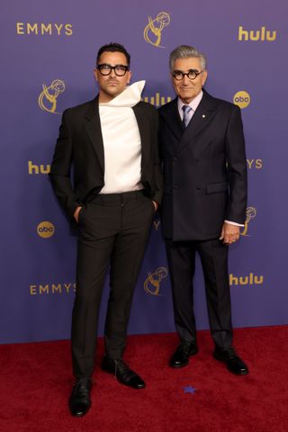 Dan Levy and Eugene Levy attend the 76th Primetime Emmy Awards at Peacock Theater on September 15, 2024 in Los Angeles, California.