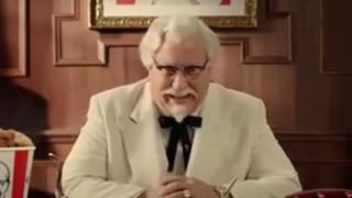 Darrell Hammond dressed as Colonel Sanders says it's finger lickin good.