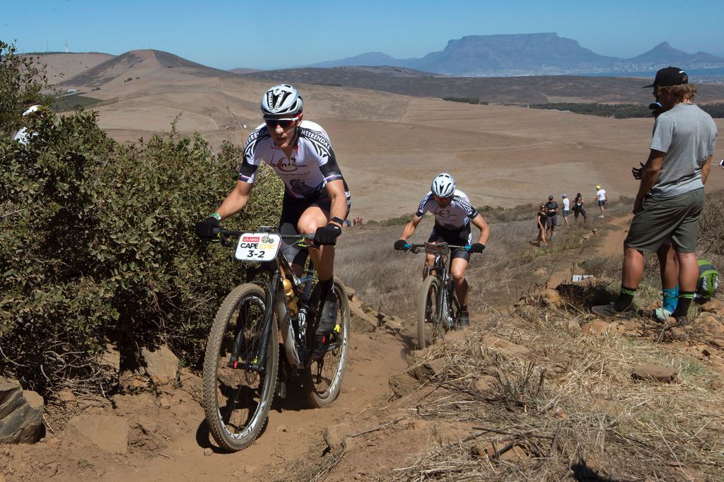 Jaroslav Kulhavy leading teammate Christoph Sauser in the prologue