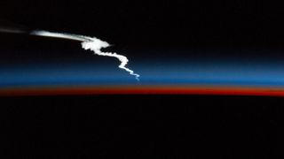 A high-definition camera on the International Space Station's exterior captured this photo of the plume created by a SpaceX Falcon Heavy rocket as it launched the USSF-67 mission for the U.S. Space Force on Jan. 15, 2023.