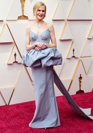 Nicole Kidman wearing a pale blue dress with voluminous middle on oscars red carpet