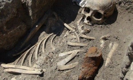 In Bulgaria, a chunk of iron is found next to a supposed vampire skeleton that dates back to the Middle Ages.